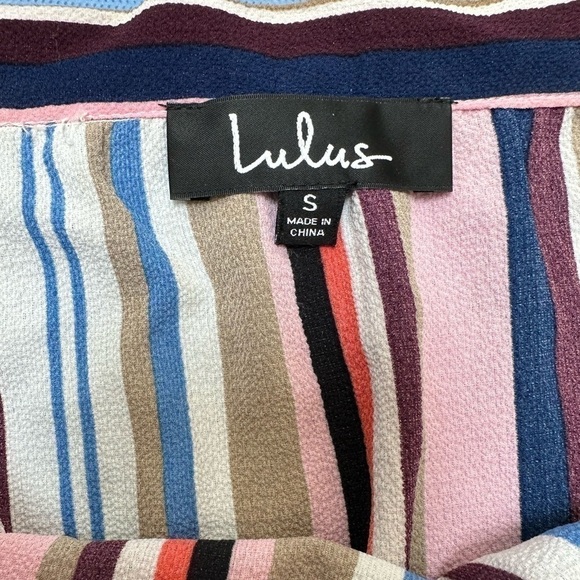 Lulu’s Off the Shoulder, Peplum Ruffled Cuff Bow Tie Cuffs Striped Top - Picture 2 of 13